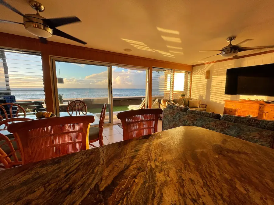 Dining area beside the oceanfront windows
