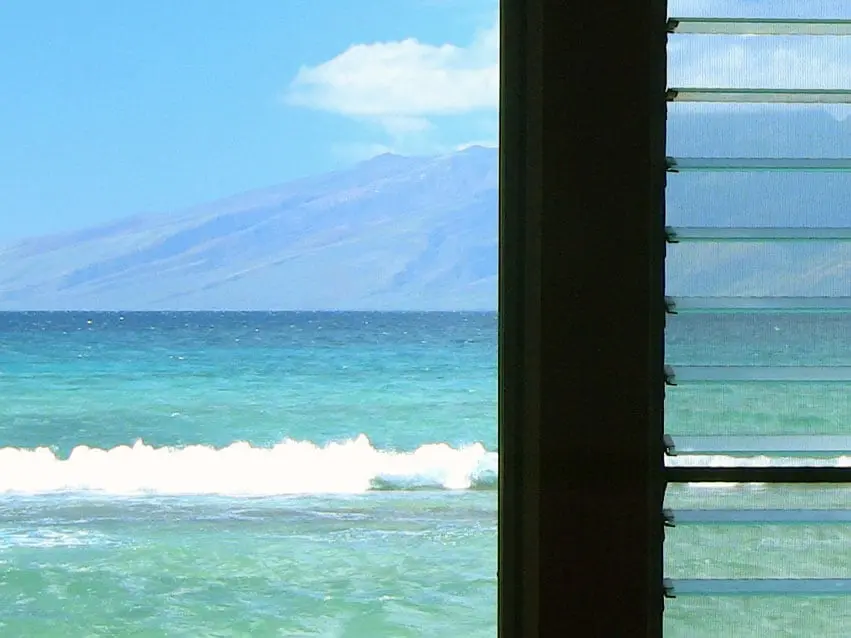 The steep ravines and lushness of the windward side of the island of Molokai appear larger then life.